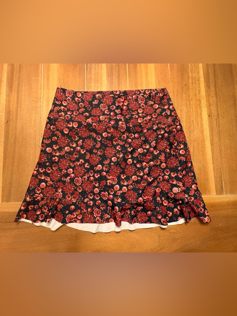 Albion Black Mini Skirt with Red Floral Print and Ruffle Hem